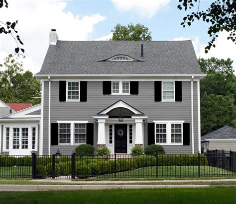 metal roofs on grey houses|grey houses with black shutters.